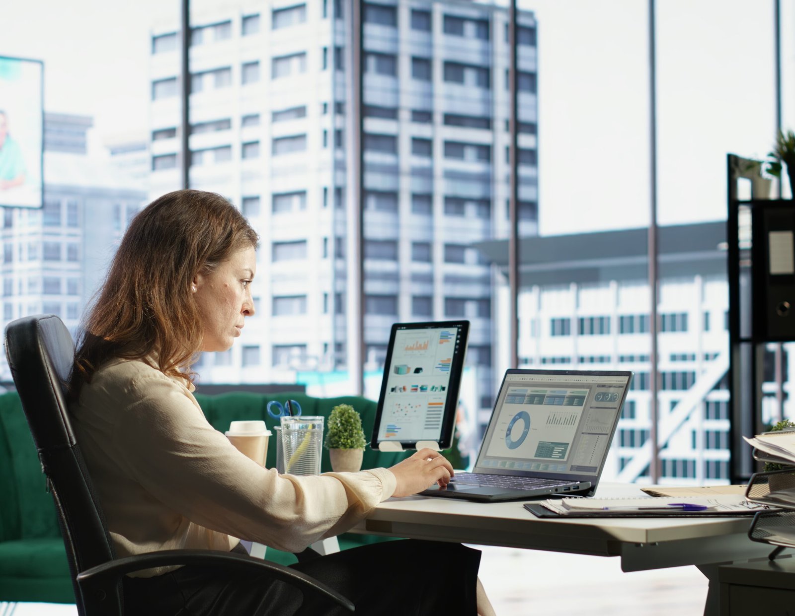 empowered female ceo working her high end corporate office scaled
